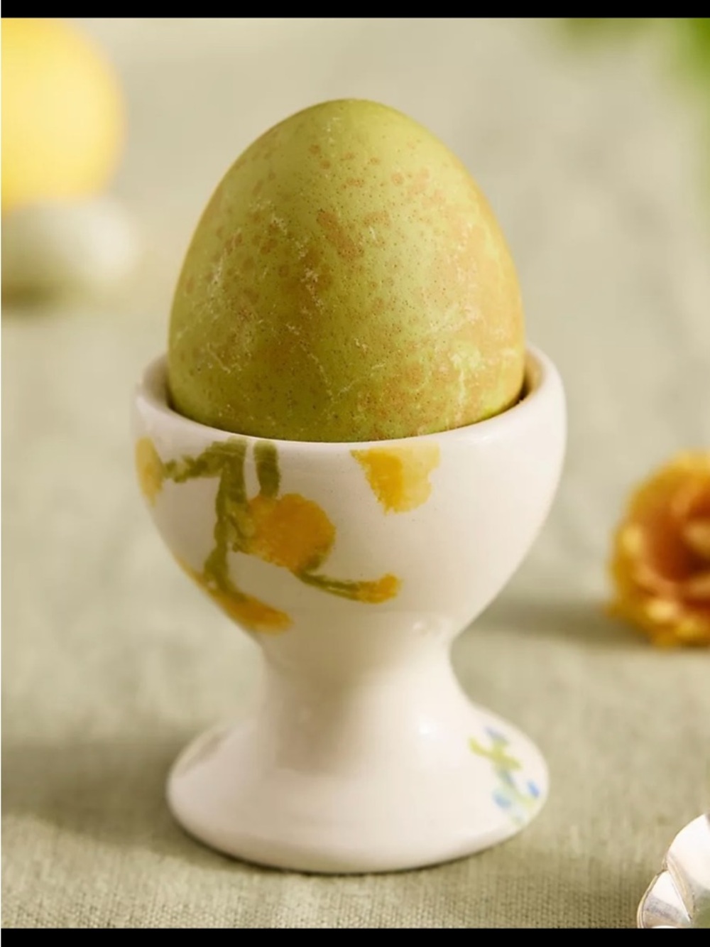 Anthropologie White Ceramic Egg Cup with Yellow Floral Motif
